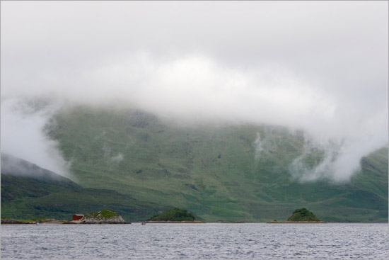 Morning mists descending from Ladhar Bheinn, reaching for Barisdale landing point on Loch Hourn