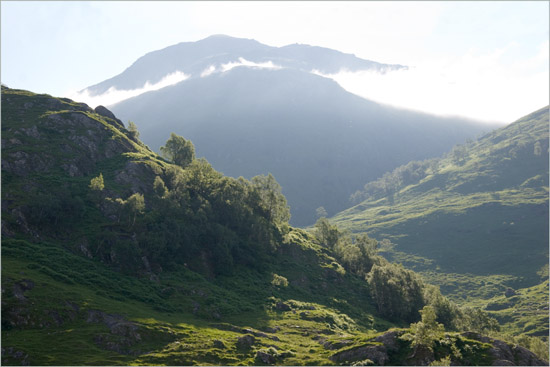 Early morning sun chasing away the mists from Sgurr a' Mhaoraich