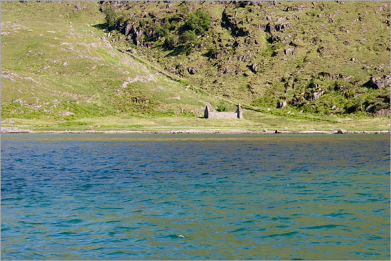 The ruins of Barisdale chapel from the bay, the path from Kinloch Hourn behind it
