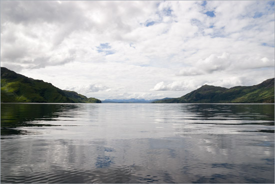 Loch Hourn smooth and shivering, the Cuillins smoking in the distant West